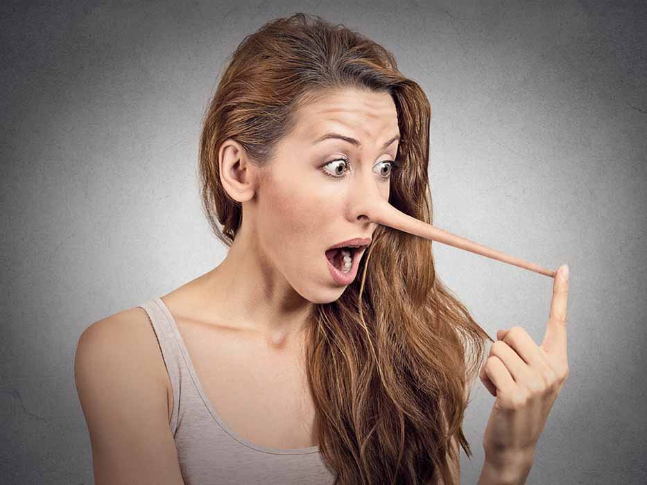Liar surprised woman with long nose